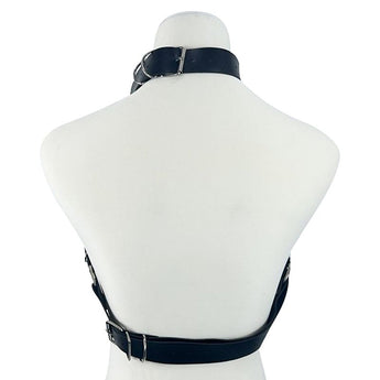 Harness feminino preto com contorno de busto, correntes e fivelas metálicas